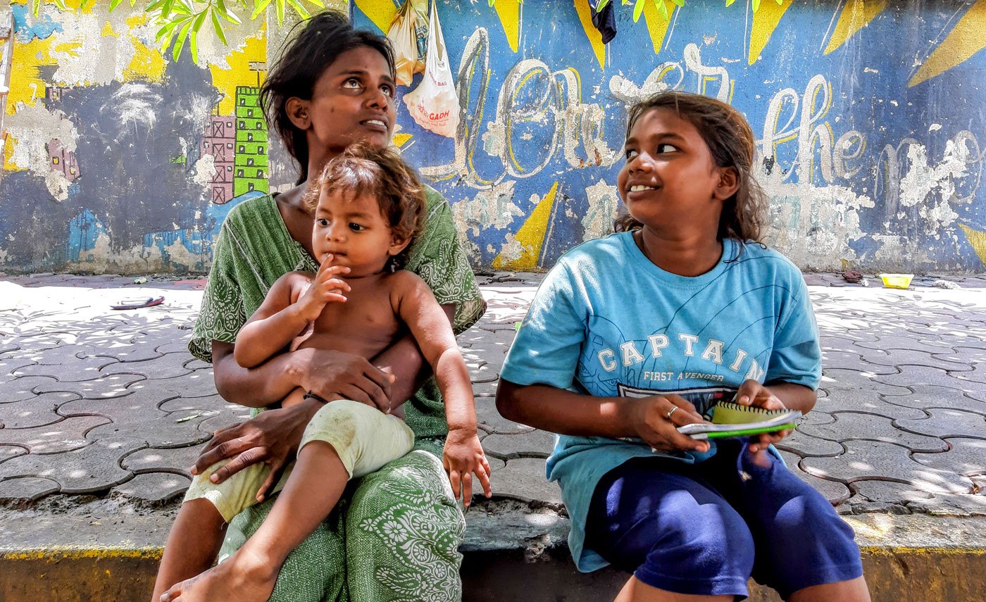 'I have never really slept [at night],' says Meena, who worries about her children's safety, especially her daughters Shama and Sangeeta (right)