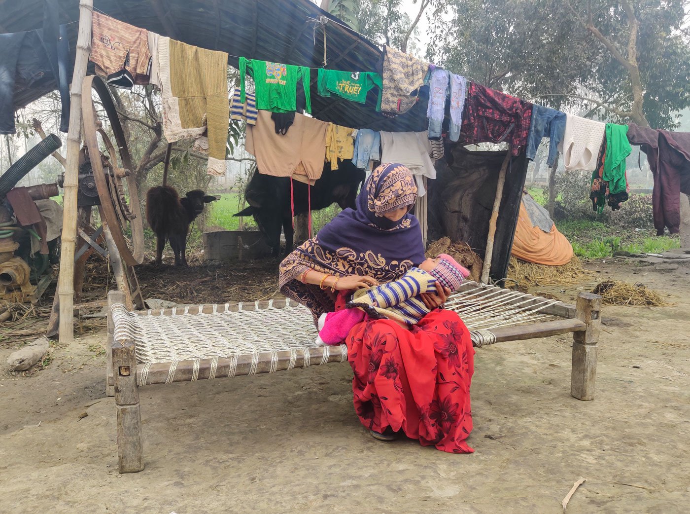 Priya with her infant daughter. Her pregnancy was risky too, but she made it through