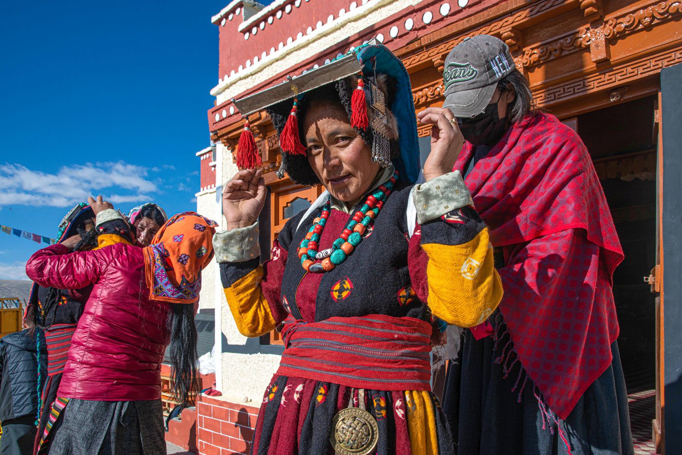 Anmong Siring, 44, is getting ready for the festival. She is dressed in sulma, a long gown made of of wool, brocade, velvet and silk. It is paired with tiling, a blouse made of either cotton, nylon, or silk