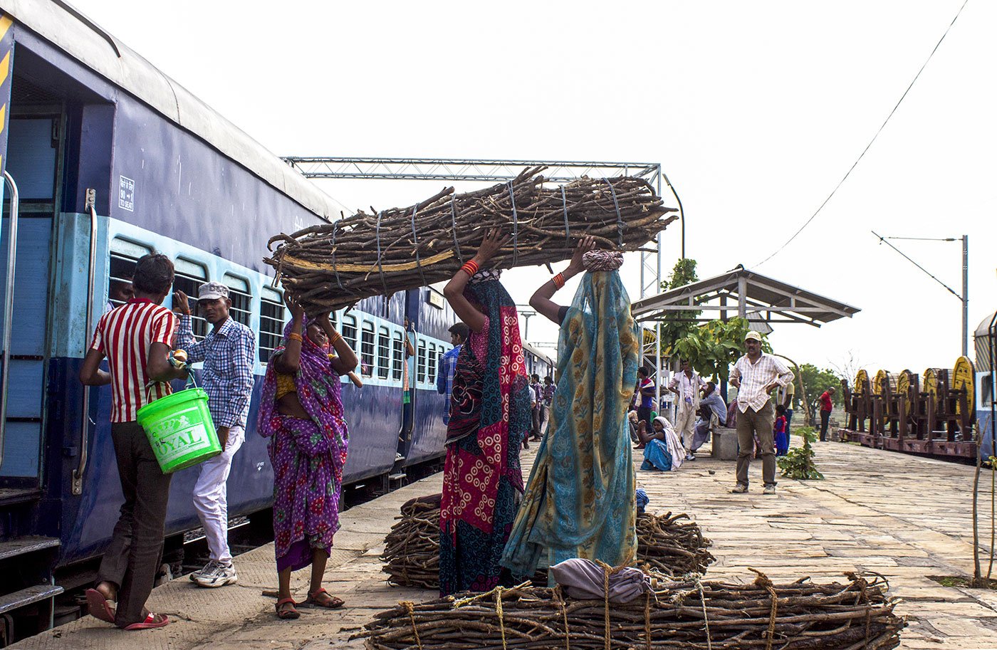 Waiting to load the firewood on the train at Shankargarh station