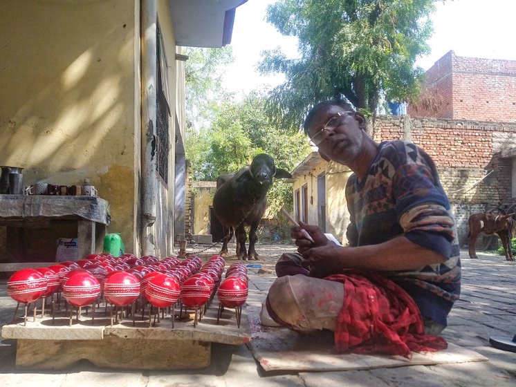 Left: Dharam puts lacquer on finished balls to protect the leather from wearing out.