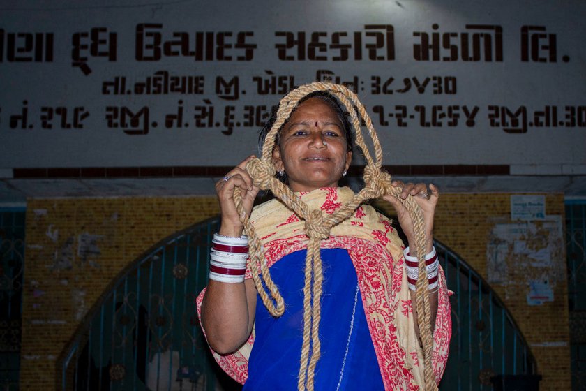 Left: Using one of the ropes, Karuna demonstrates how to tie a loop used to tether animals.