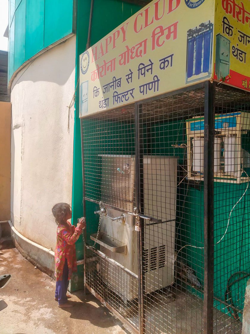 Left: Some migrants get access to filtered tap water from a clinic.