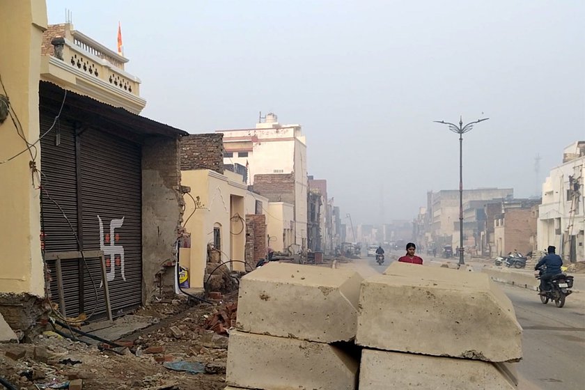 Left: Structures that were demolished to widen the main road, 'Ram Path'.