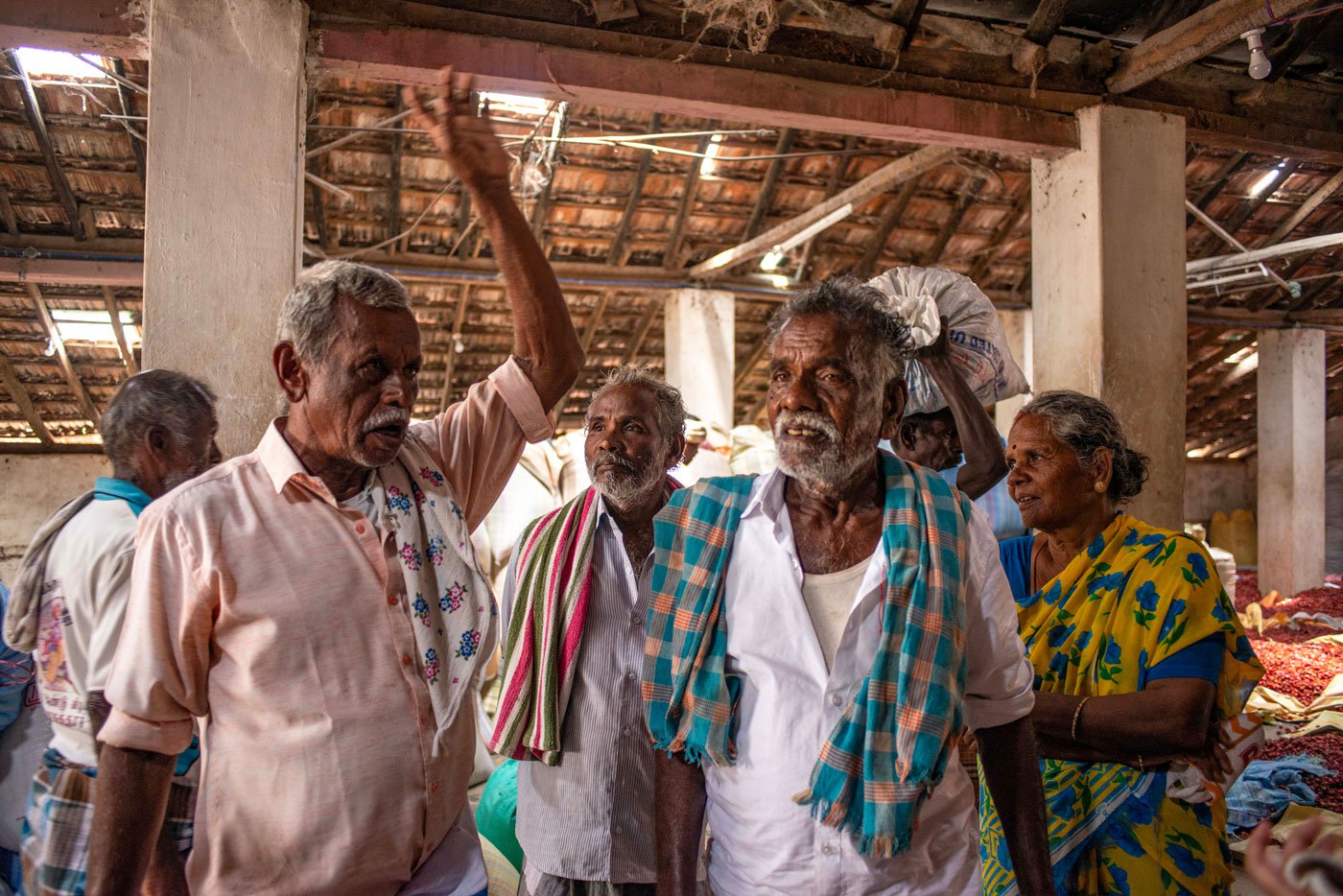 Govindrajan (left) in an animated discussion while waiting for the auctioneer