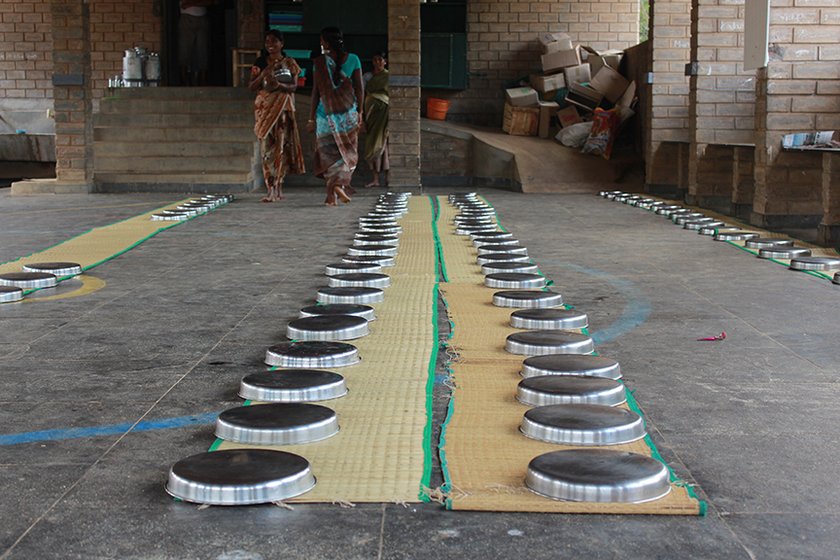 Left: In the open dining hall, there is silence before the storm. Right: Plates and mats just before the children storm in