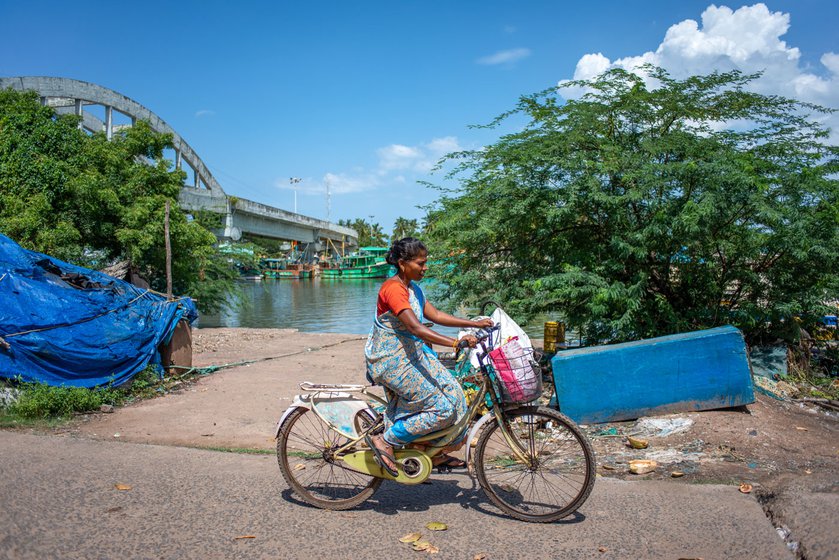 Left: Kavitha returns home to do housework on a cycle.