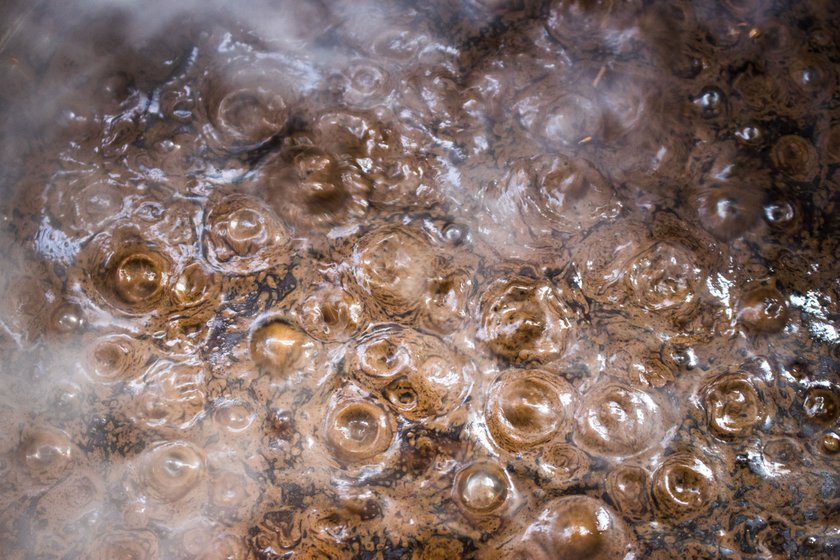 Left: Crushed castor seeds and water simmers.