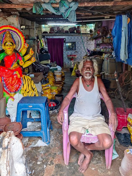 His neighbour and friend, Uppari Gauri Shankar in his house.