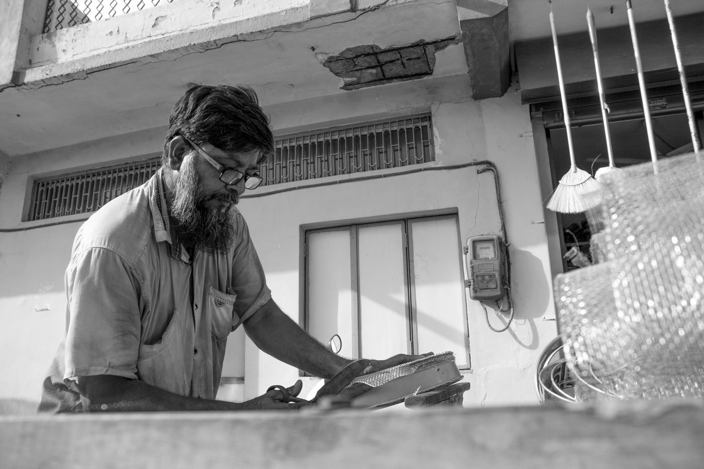 He walks from his home for about 30 kilometres, pushing his wooden cart across the city, every three days a week