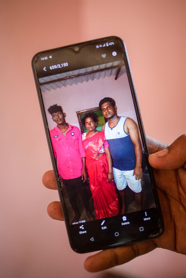 Left: A photo of Kesavan (pink shirt) with his mother, Krishnaveni and elder brother.