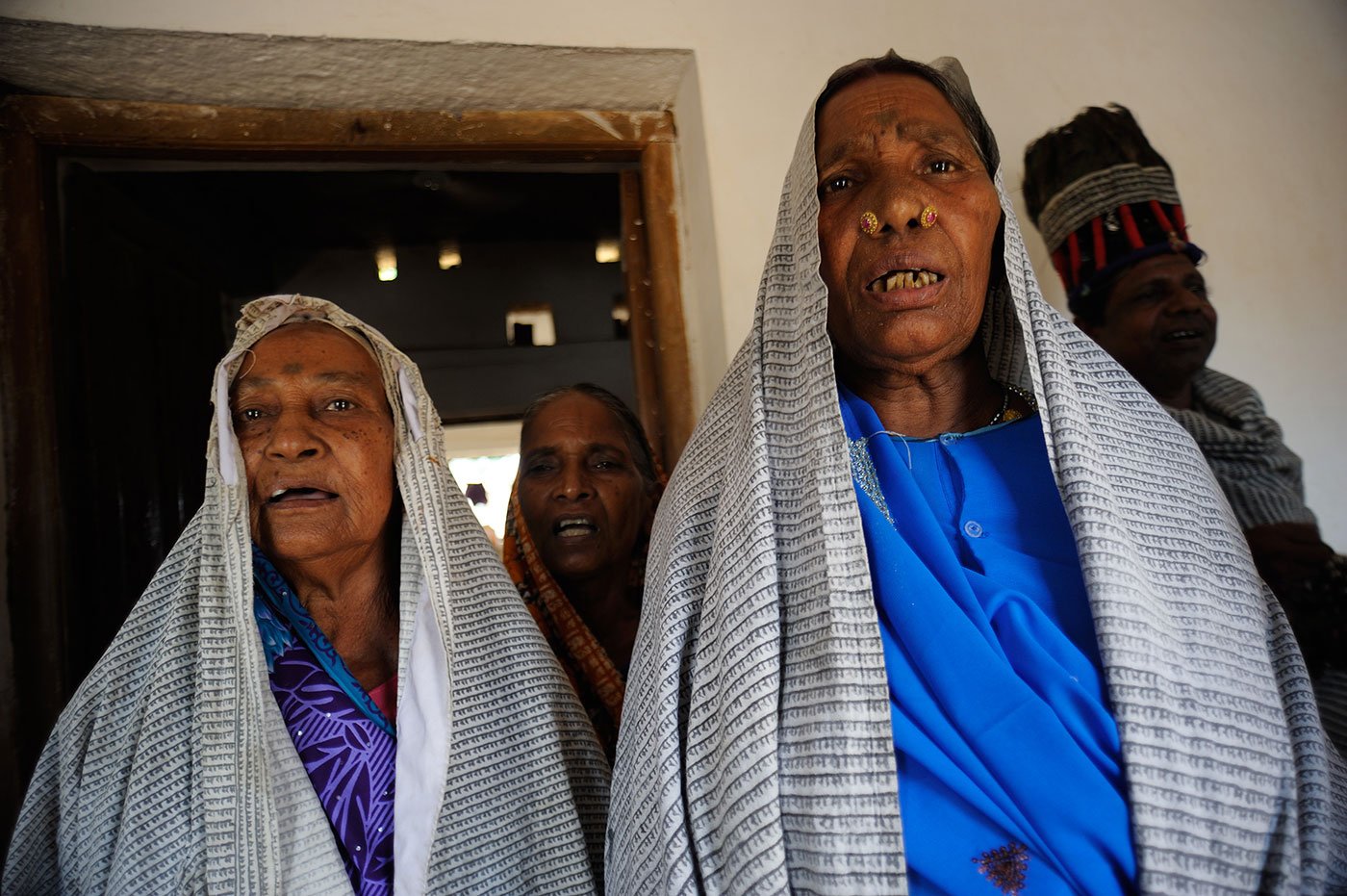 Women singing chaupai (quatrain verses) from the Ramcharitmanas