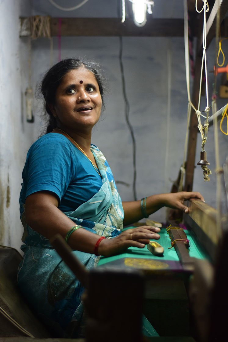 Nirmala uses multiple shuttles for complex saree designs