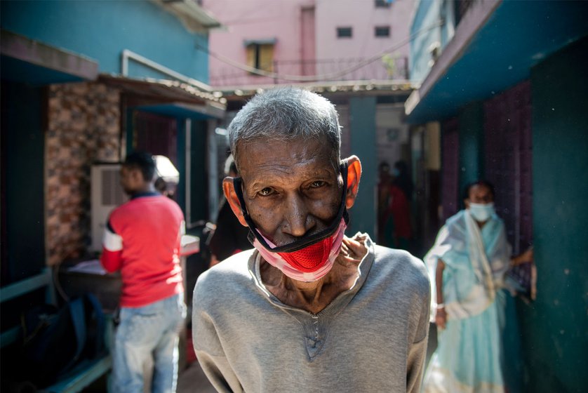 Right: 'I don't have the strength to stand. I used to work in the construction field. I came here to check my chest. Recently I have started coughing up pink phlegm,'  says Panchu Gopal Mandal