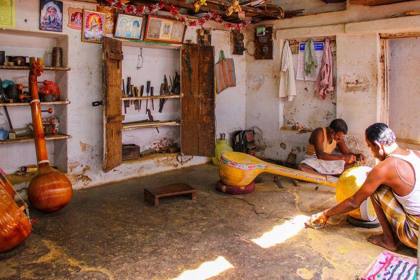 Right: Craftsmen in Narayanan’s workshop