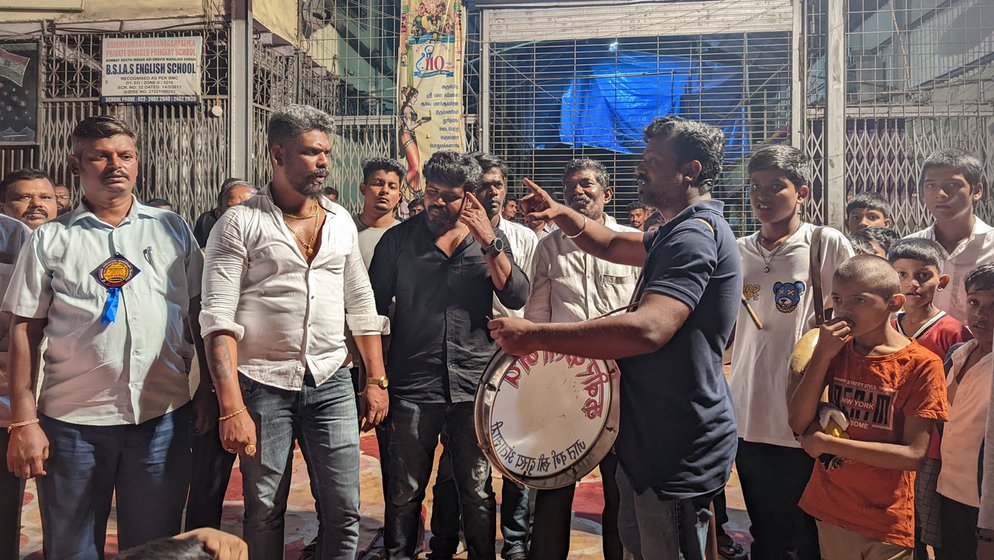 Raja Kutty Raja (white shirt and beard) and Nithyanand Palani (black shirt) are key organisers of the rally