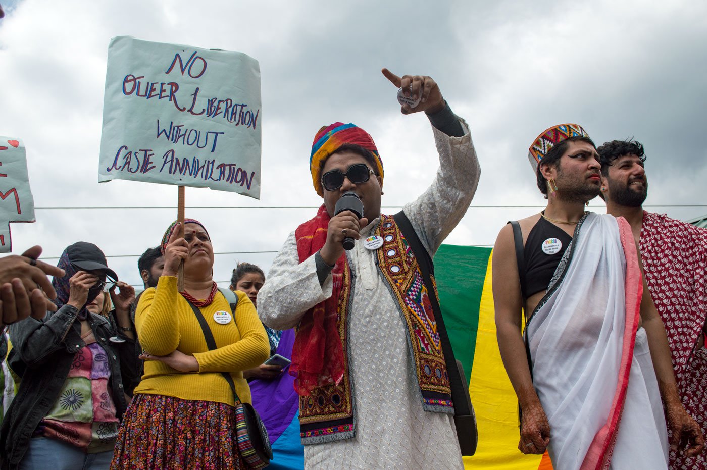 Manish Thapa (with the mike) makes a speech during the Pride march