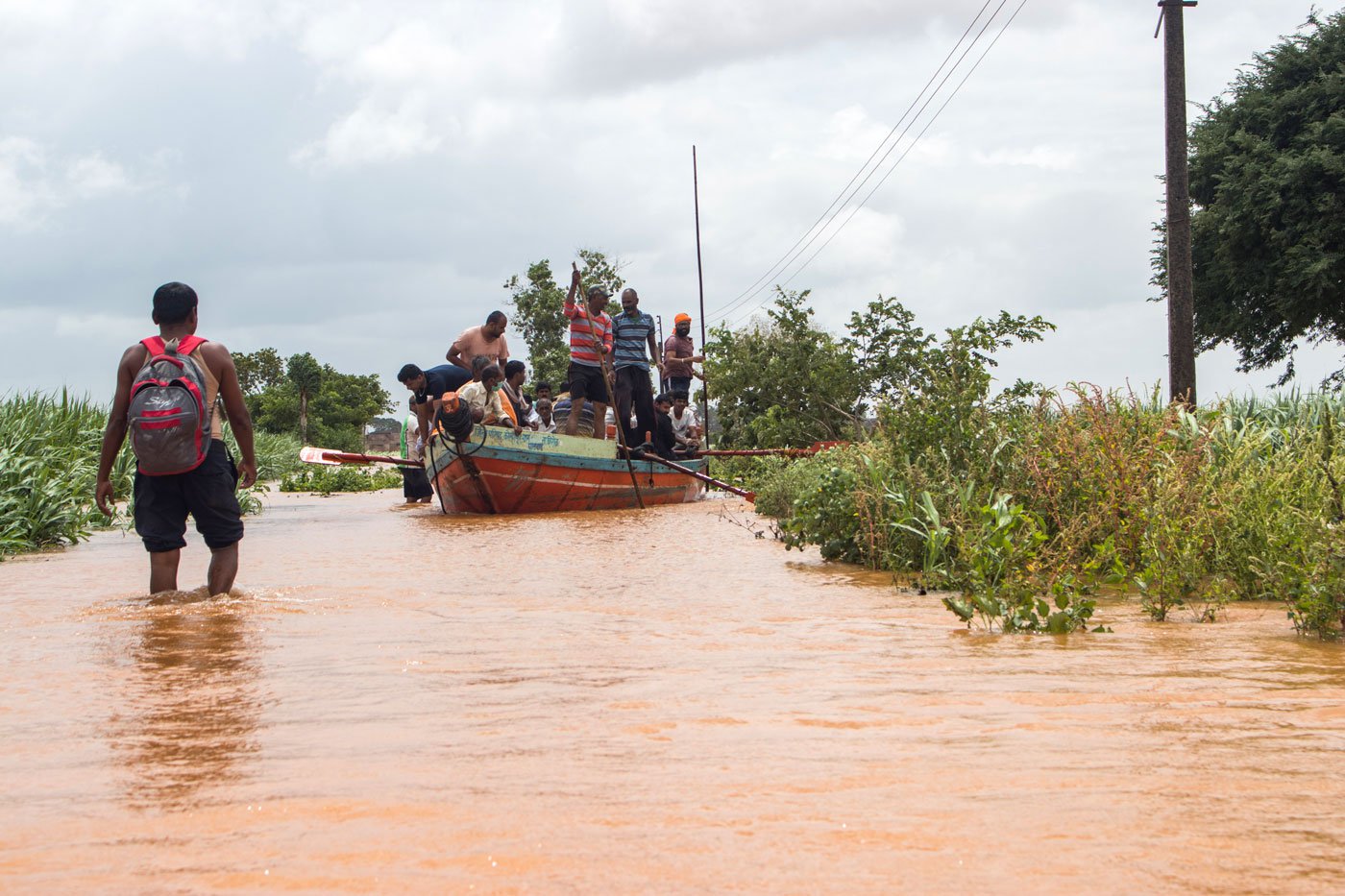 A villager watches rescue operations in Ghalwad village after the July 2021 floods