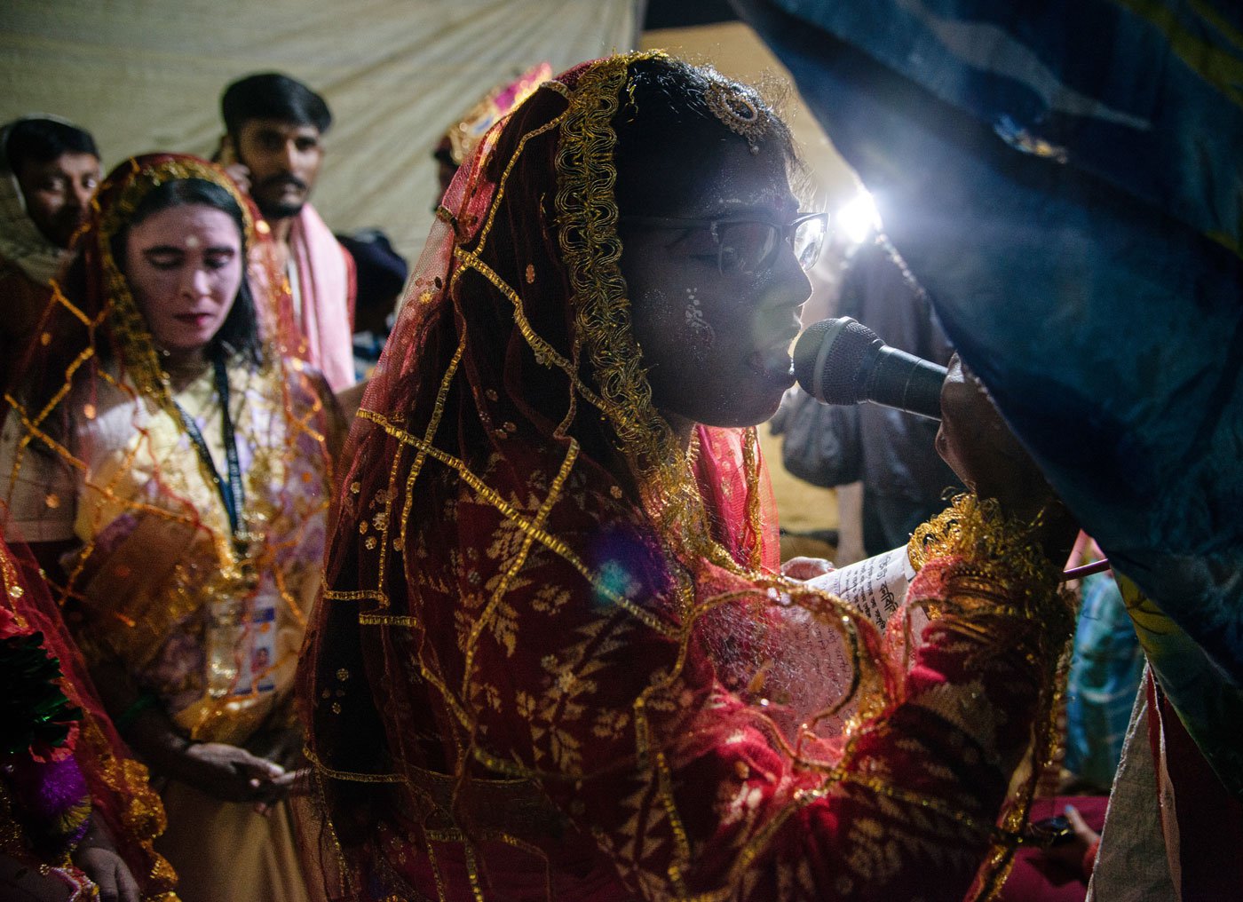 Usharani Gharani announcing the commencement of the pala gaan