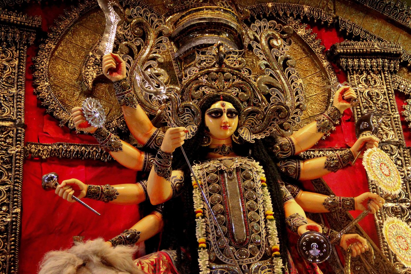 An idol of Ma Durga being readied