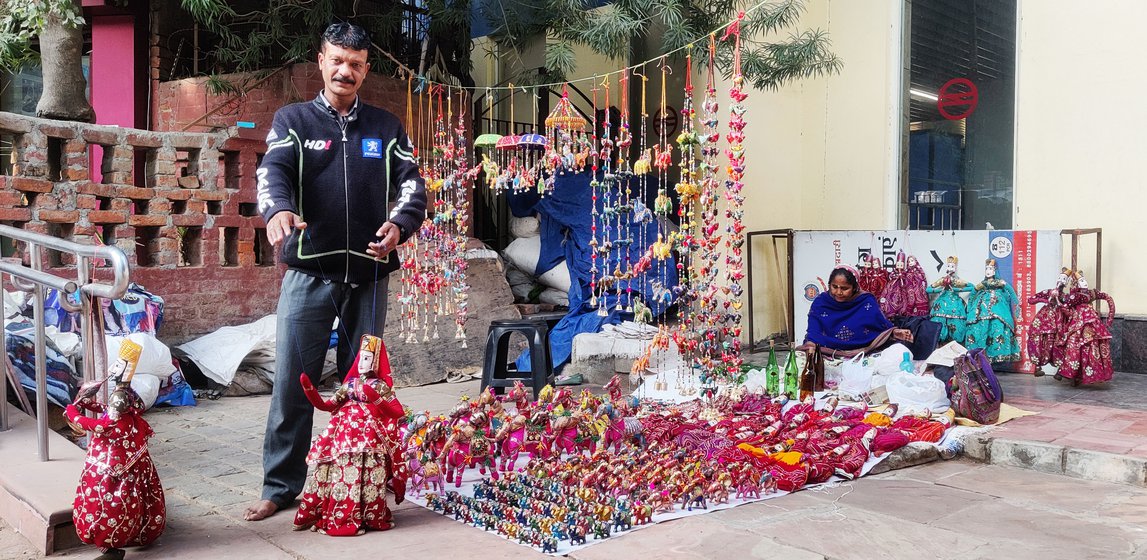 Chamanlal Bhat (left), Ashok Bhat and his wife (right) have made puppets and performed shows with them across the country