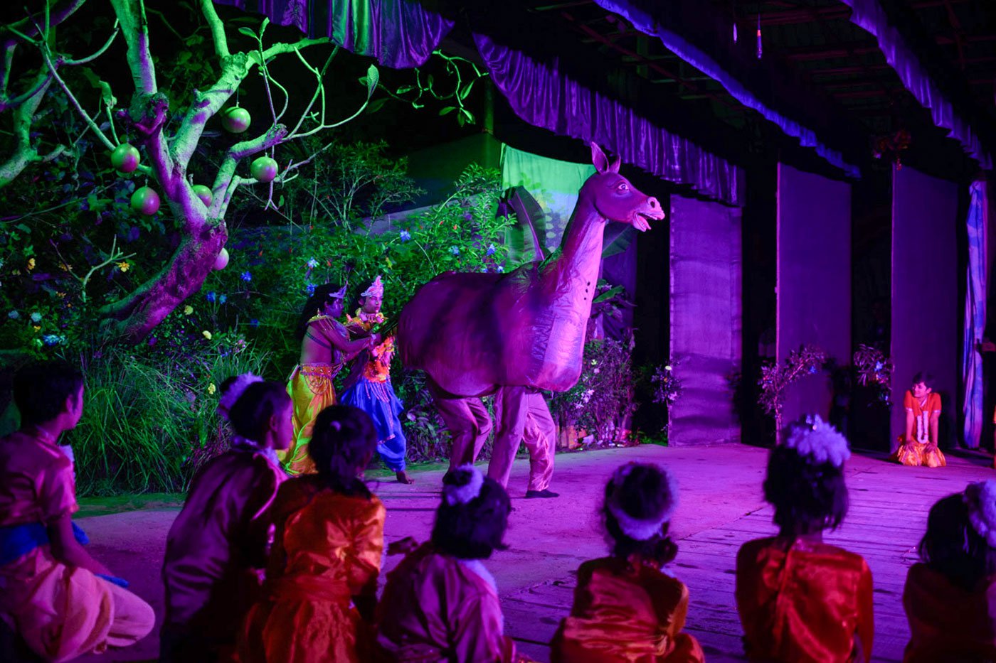 Young actors playing Krishna and his brother Balaram perform the scene of the Dhenukasura badh – death of the demon Dhenuka