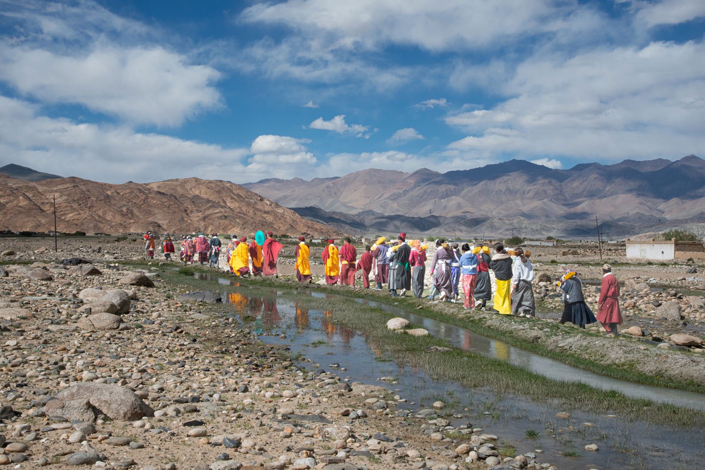 After this meal, the procession circles Pungkuk village. Not a single part of the village is missed, despite the rough terrain and windy conditions