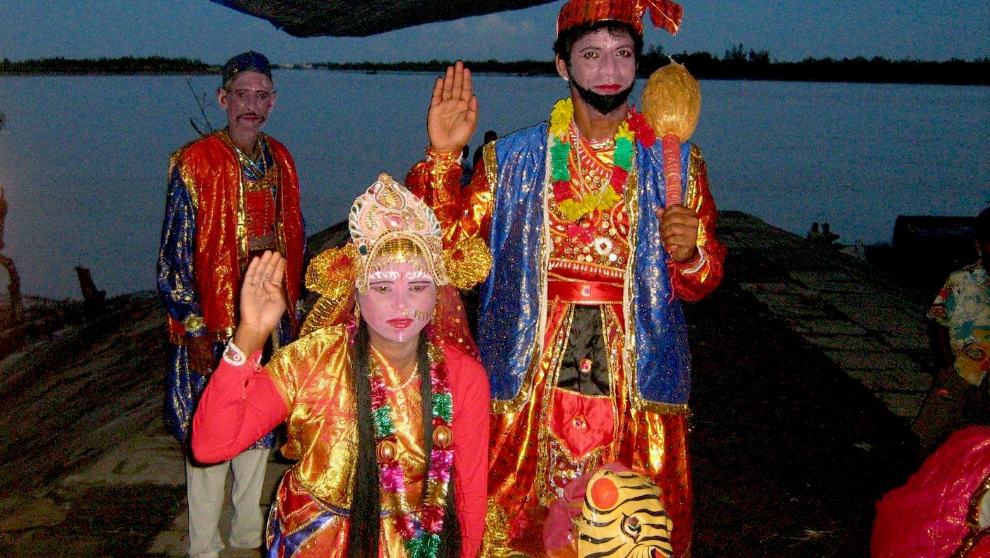 Villagers dressed as Ma Bonbibi and Dakshinrai