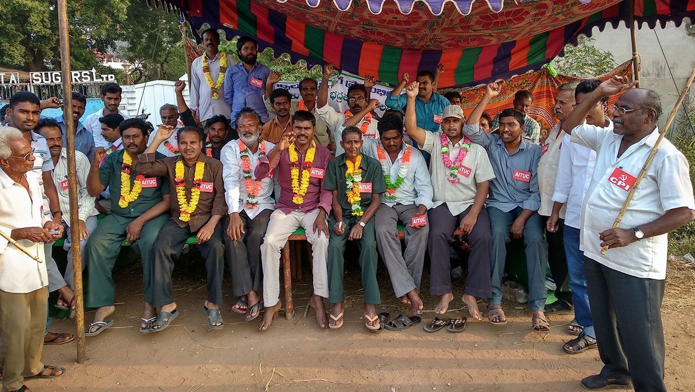 Workers protesting outside factory gates