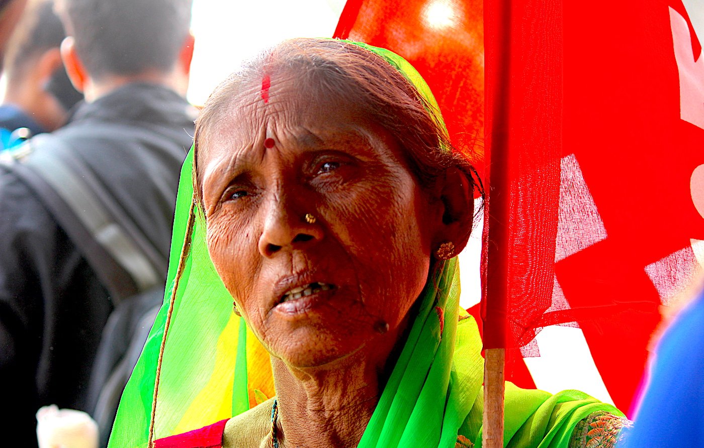 Woman giving a byte to a camera