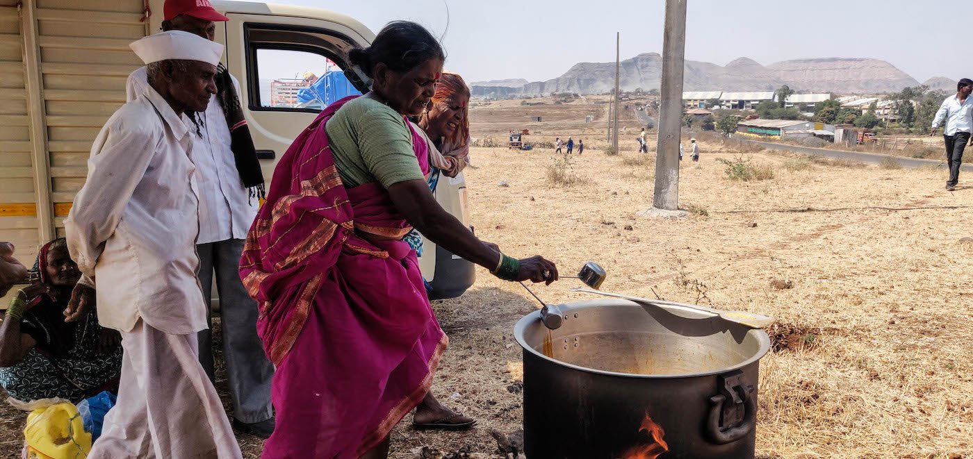 woman making chai