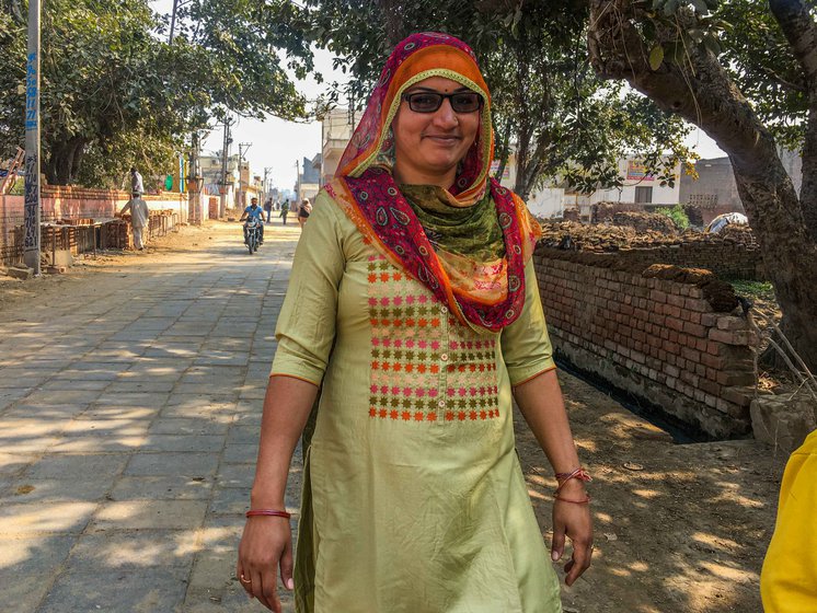 Sonia (left) and her family give their share of land in Petwar village (right) to their relatives on rent. They mainly grow wheat and rice there