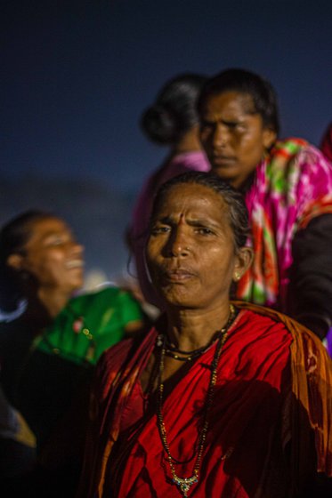 Navshya Kuvra (left), along with Taikakde Thapad (in red saree, centre) and other Adivasi women, and Navji Hadal (right) were among the performers at Azad Maidan