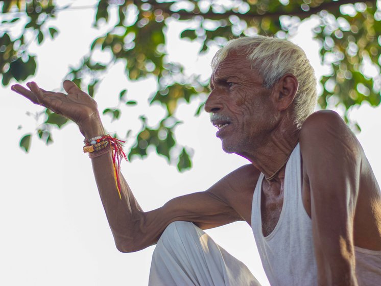 Shiv Shankar explaining the changes in his farmland (right) he has witnessed over the years