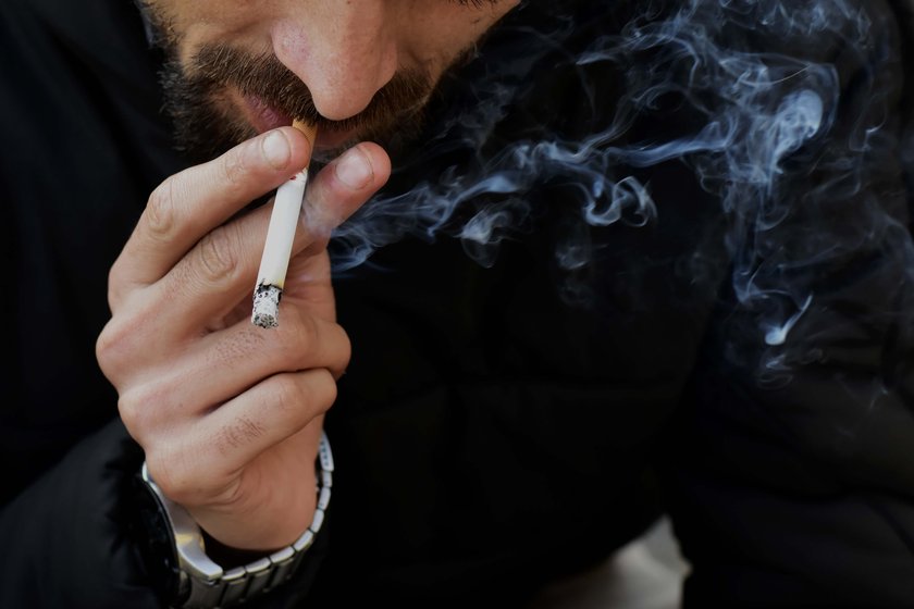 Right: Smoking on the banks of river Jhelum in Srinagar